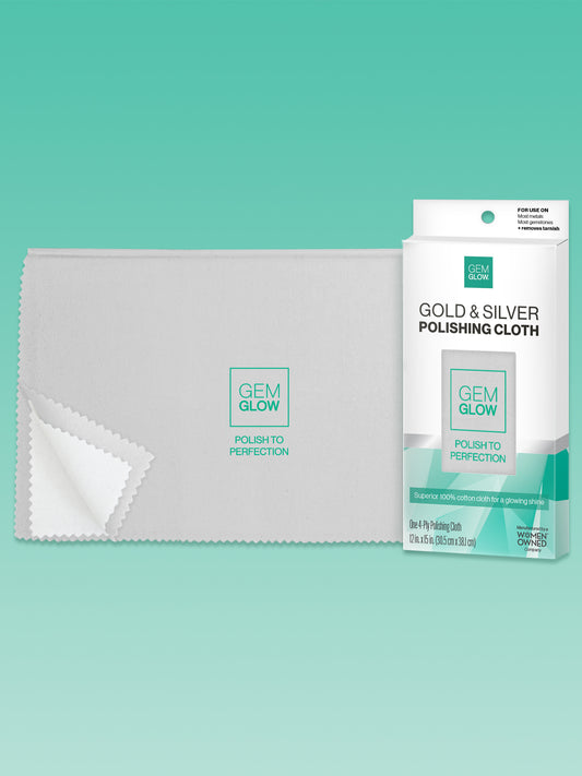 Outer packaging of the GEM GLOW Gold & Silver Polishing Cloth next to the full 12 x15 inch Cloth.