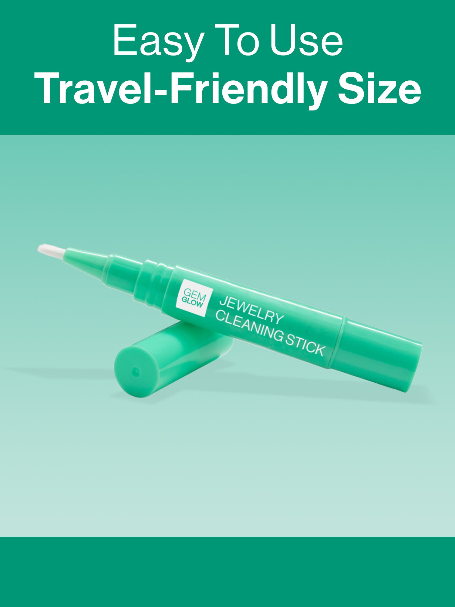 The GEM GLOW Jewelry Cleaning Stick propped up by its cap, showcasing the brush head and its easy-to-use, travel-friendly size.