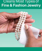 Hands using a Gem Glow Jewelry + Watch Cleansing Wipe to clean a pearl bracelet.