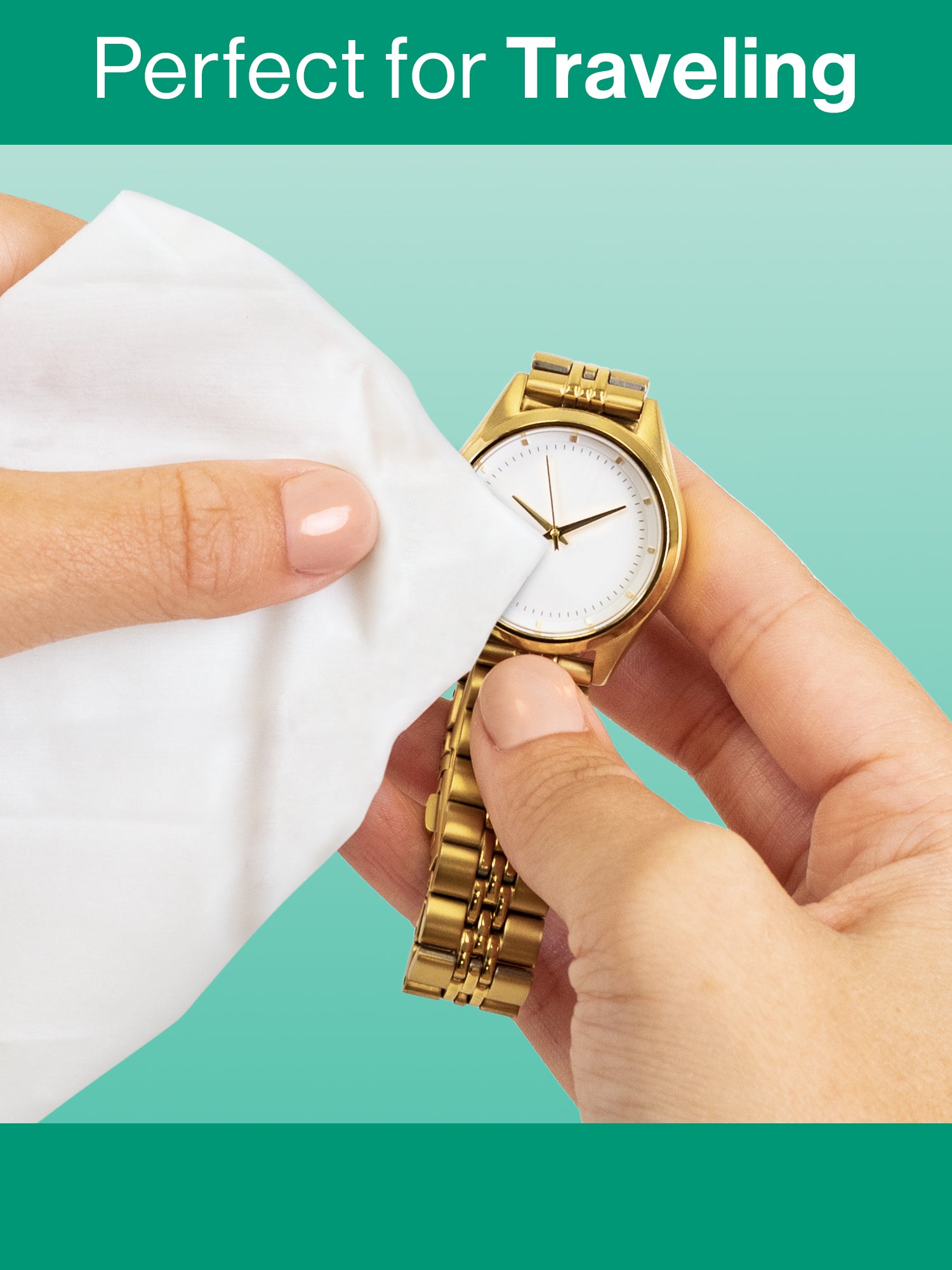 Hands using a Gem Glow Jewelry + Watch Cleansing Wipe to clean a gold watch face.
