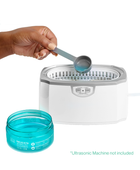 Hand pouring Delicate Jewelry Cleaner into Professional Ultrasonic Cleaner