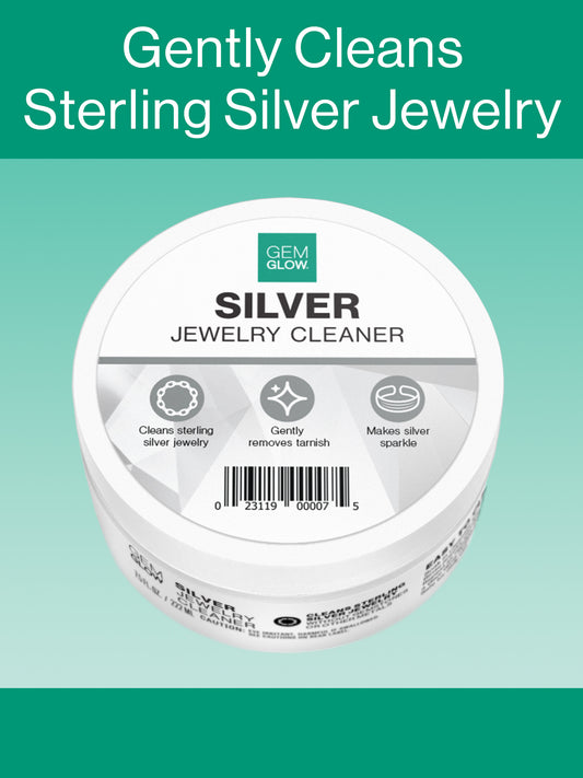 Top view of the GEM GLOW 7.5 oz. Silver Jewelry Cleaner Jar, which indicates that it gently removes tarnish from sterling silver.